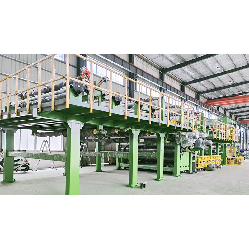 How does the unique design of the three-layer/four-layer light box cloth laminating machine ensure stability during long-term operation?