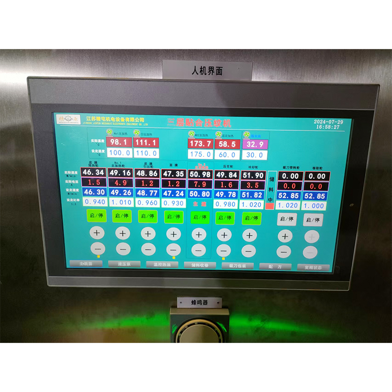 How does the drying system of a four-layer light box cloth laminating machine balance efficiency and the risk of thermal deformation of the film material?